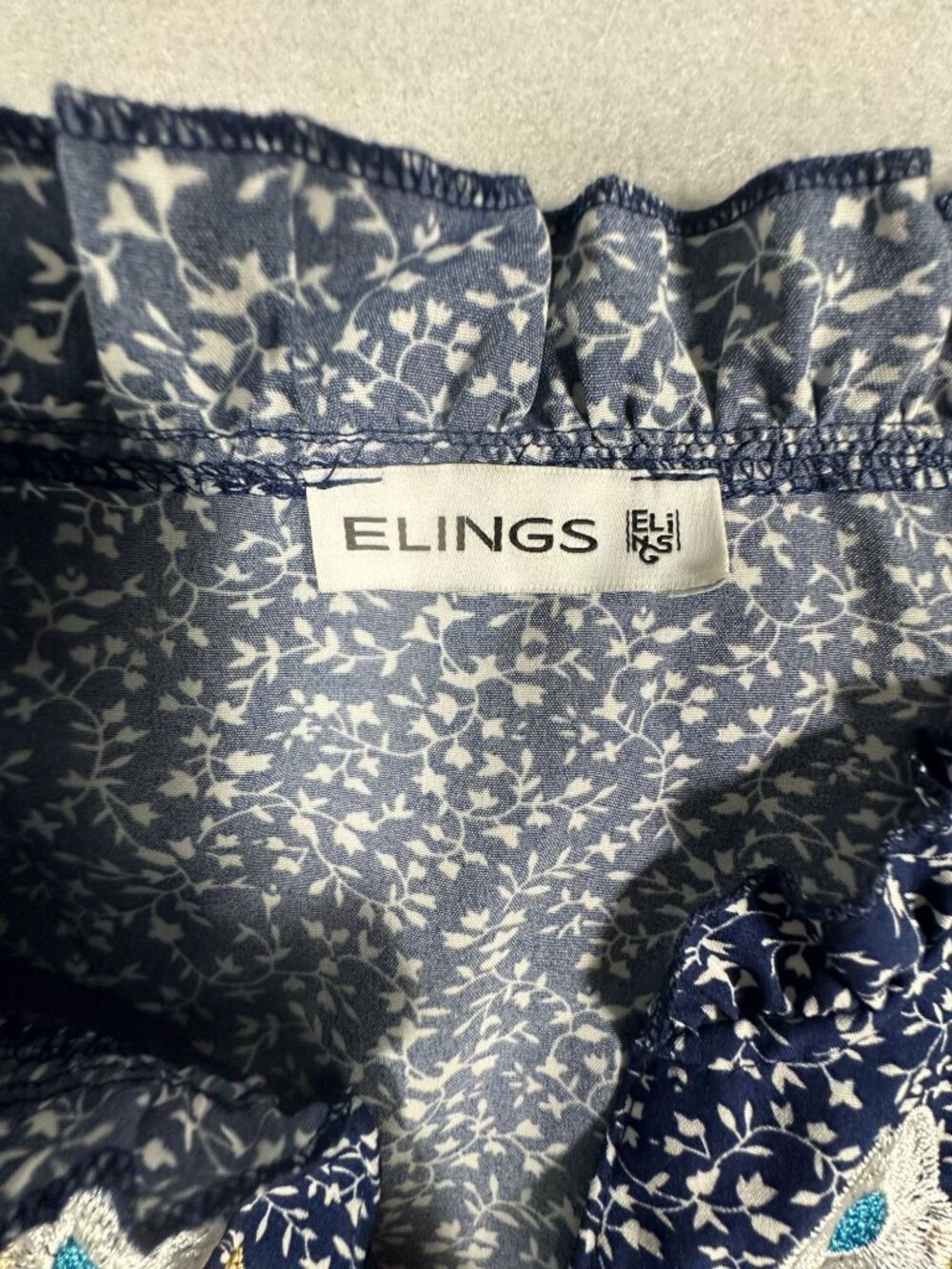 Elings Floral Embroidered Navy Blouse Short Puff Sleeves Ruffle Neckline Polyest - Picture 5 of 8